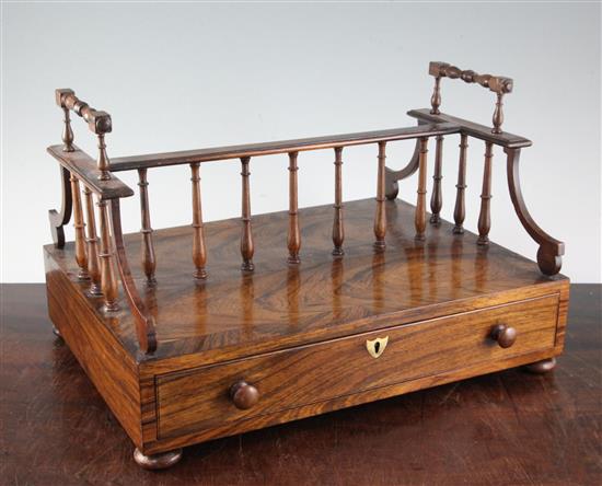 A good Regency rosewood two handled double sided book carrier, W. 1ft 3in. D. 11in. H. 9.5in.